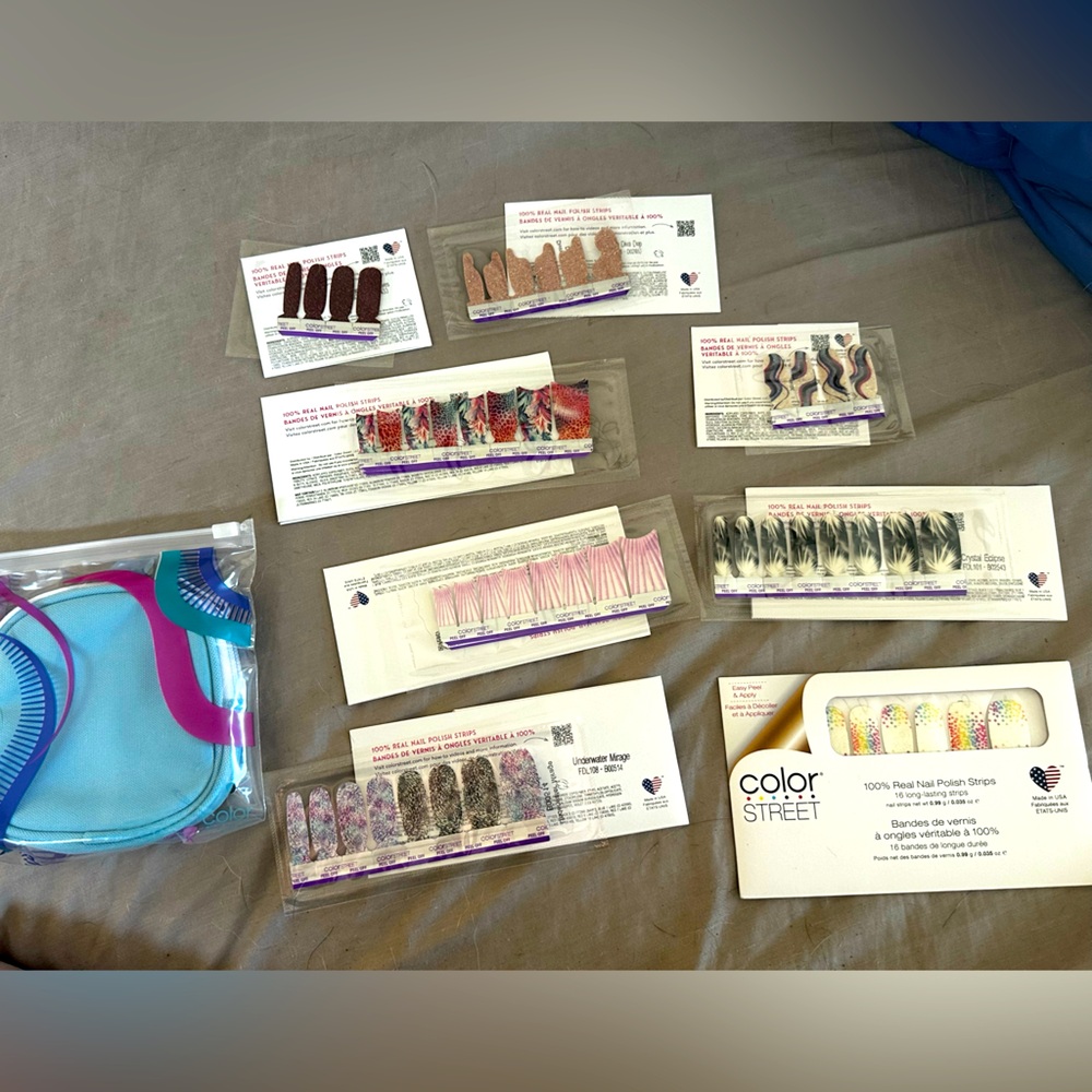 5 full sets, 3 mini sets of Colorstreet nail strips with a to go pouch